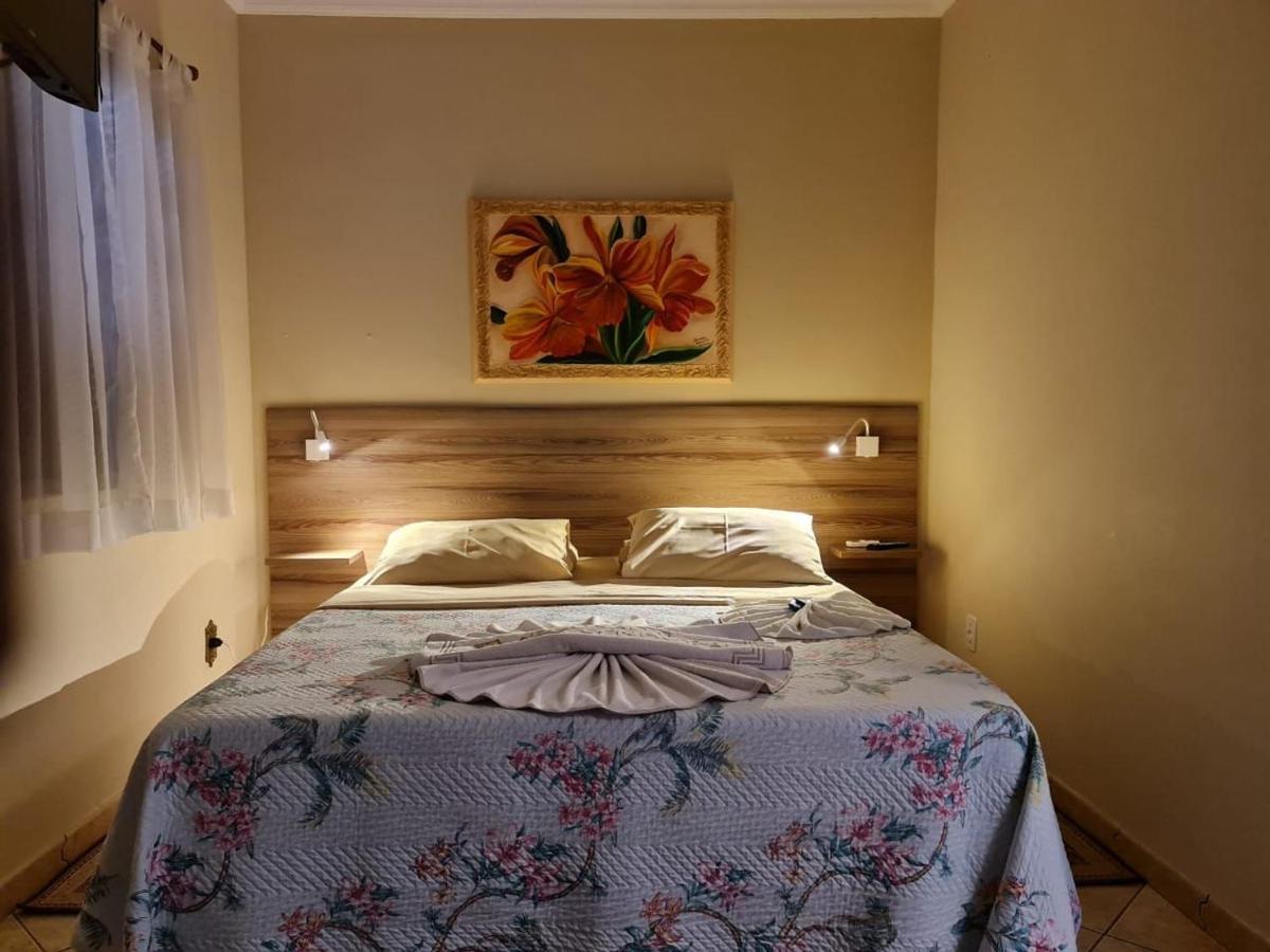 Pousada Nossa Senhora Penedo  Dış mekan fotoğraf A bedroom in a hotel in Brazil