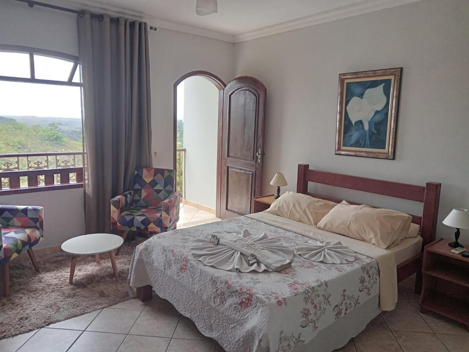 Pousada Nossa Senhora Penedo  Oda fotoğraf A bedroom in a hotel