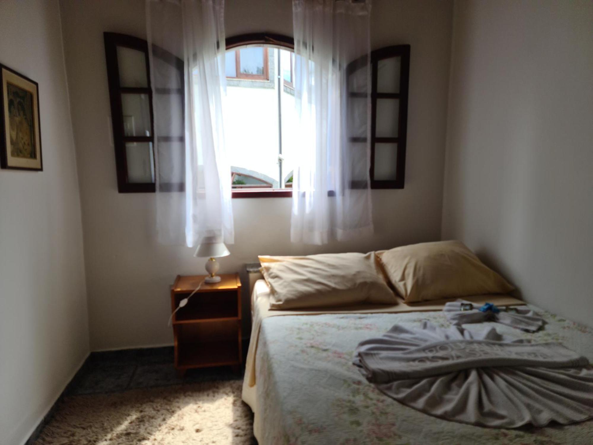Pousada Nossa Senhora Penedo  Oda fotoğraf A bedroom in a hotel in Brazil