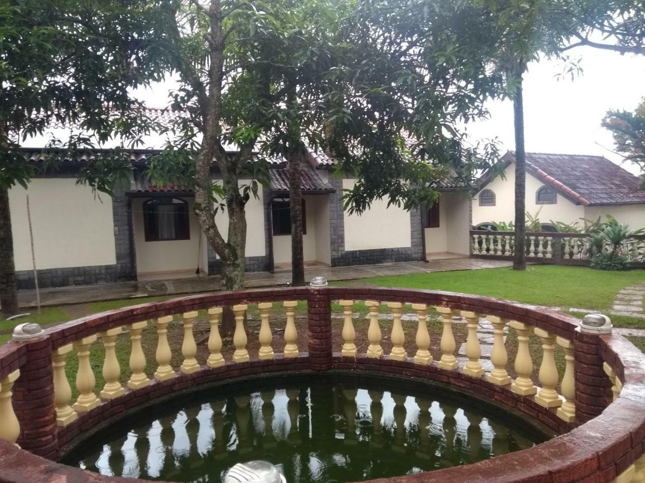 Pousada Nossa Senhora Penedo  Dış mekan fotoğraf The fountain at the front of the house